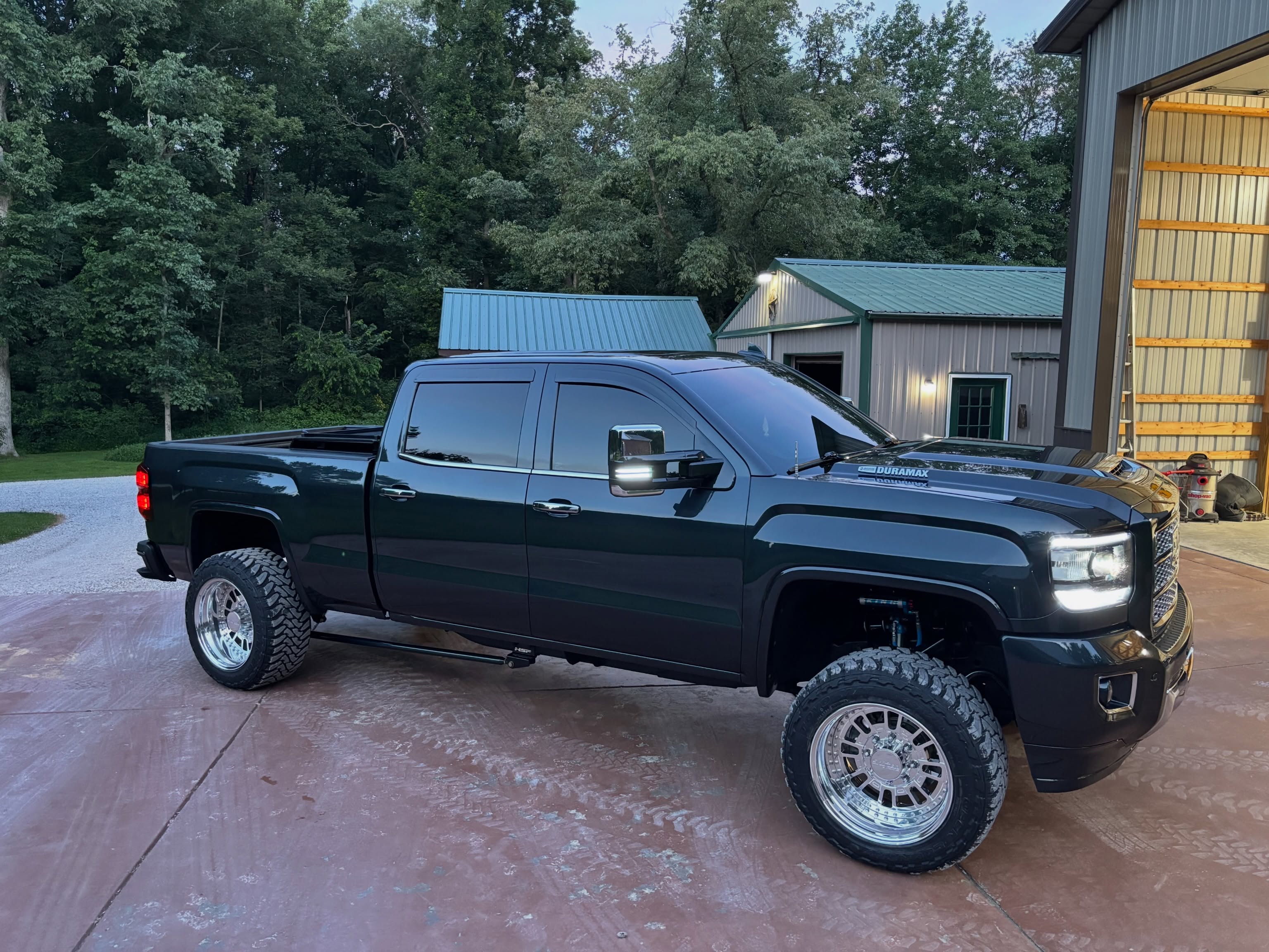 Shifted Industries lifted truck with chrome forged wheels