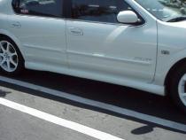 Nissan Maxima 4 Piece Body Kit w/Touring Style Lip Spoiler Unpainted For 02-03 Nissan Maxima Stillen